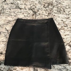 Black leather skirt with a side zip
